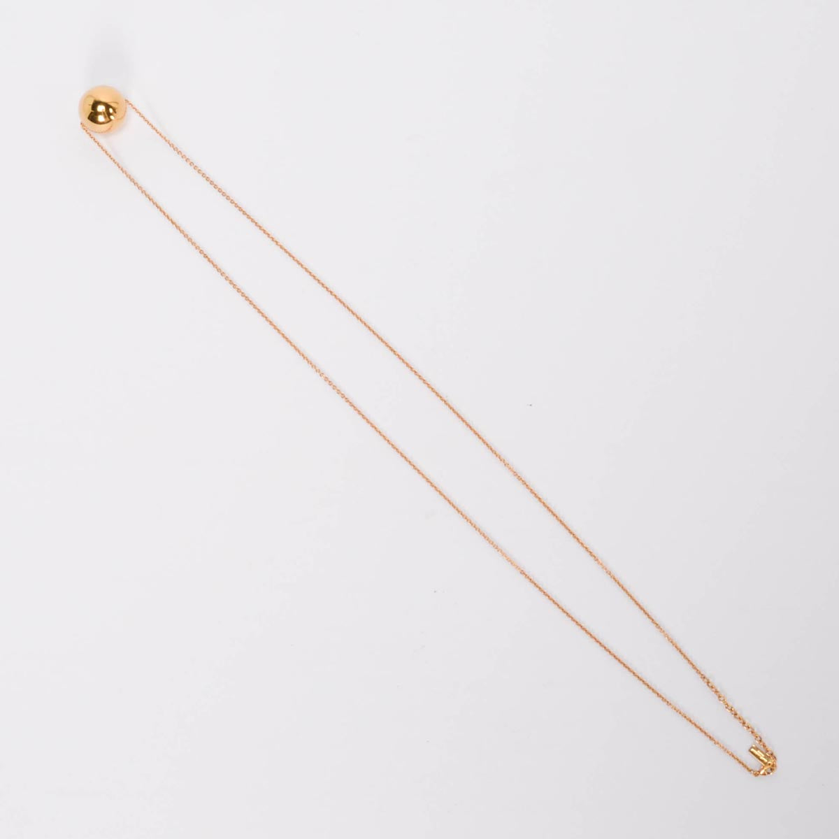 Saint Laurent Gold Tone Sphere Pendant