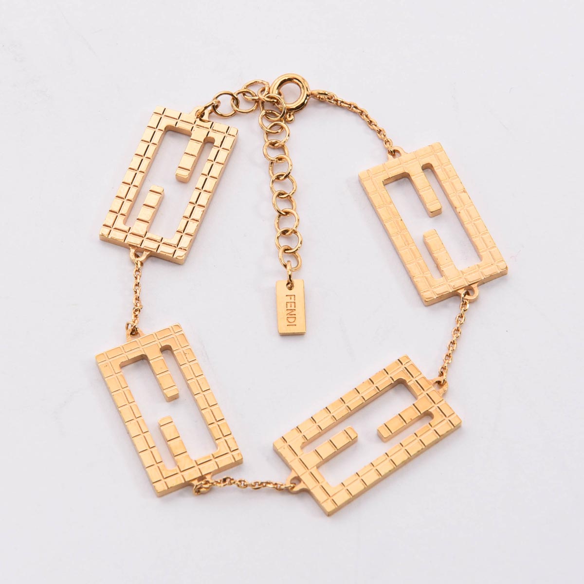 Fendi Gold Tone Metal Baguette Bracelet
