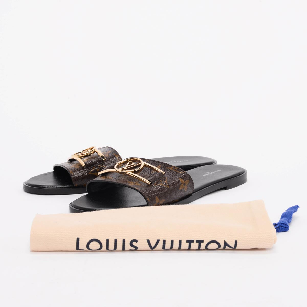 Louis Vuitton Black Monogram Lock It Flat Mules 40