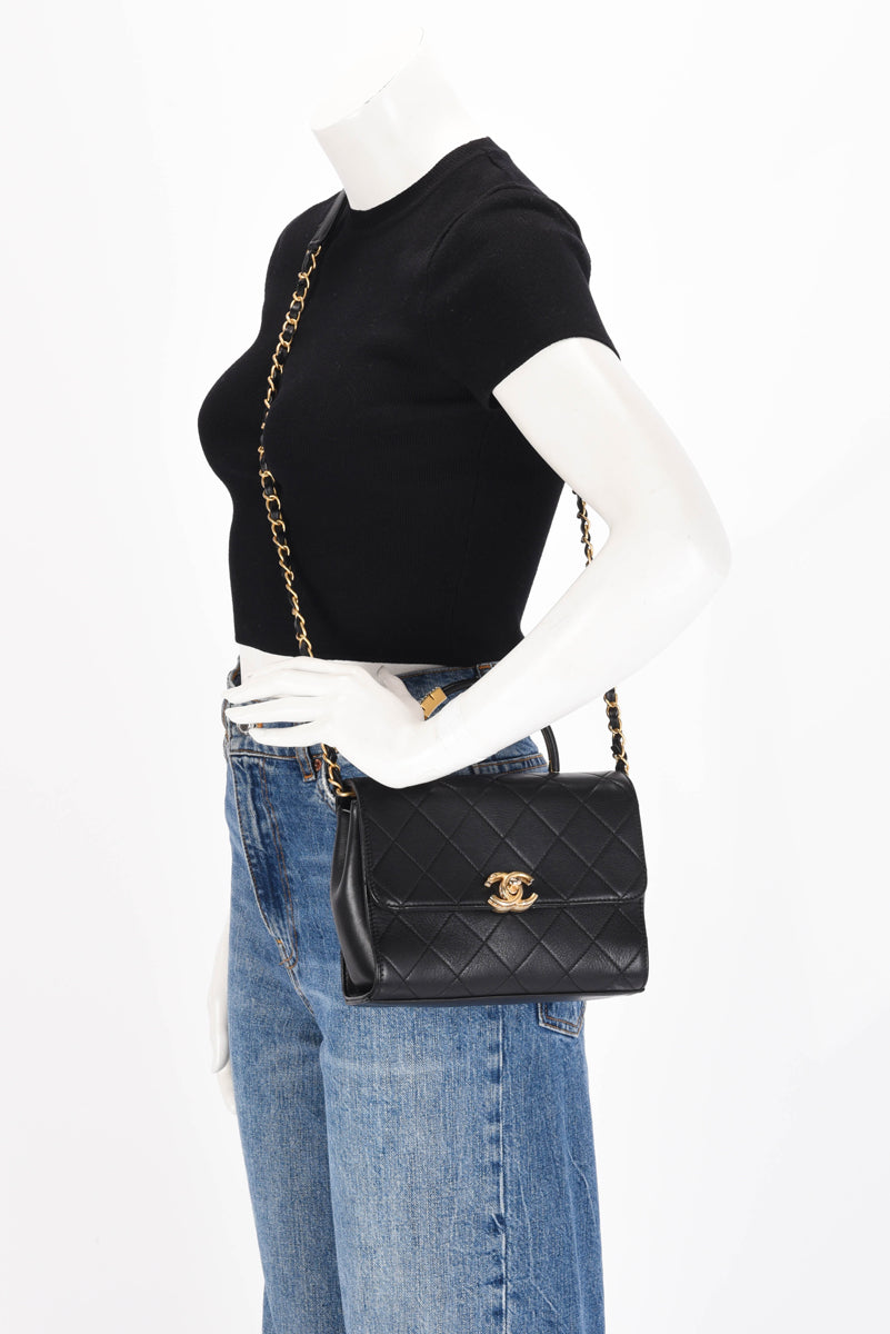 Chanel Black Calfskin Pearl Logo Top Handle Flap Bag