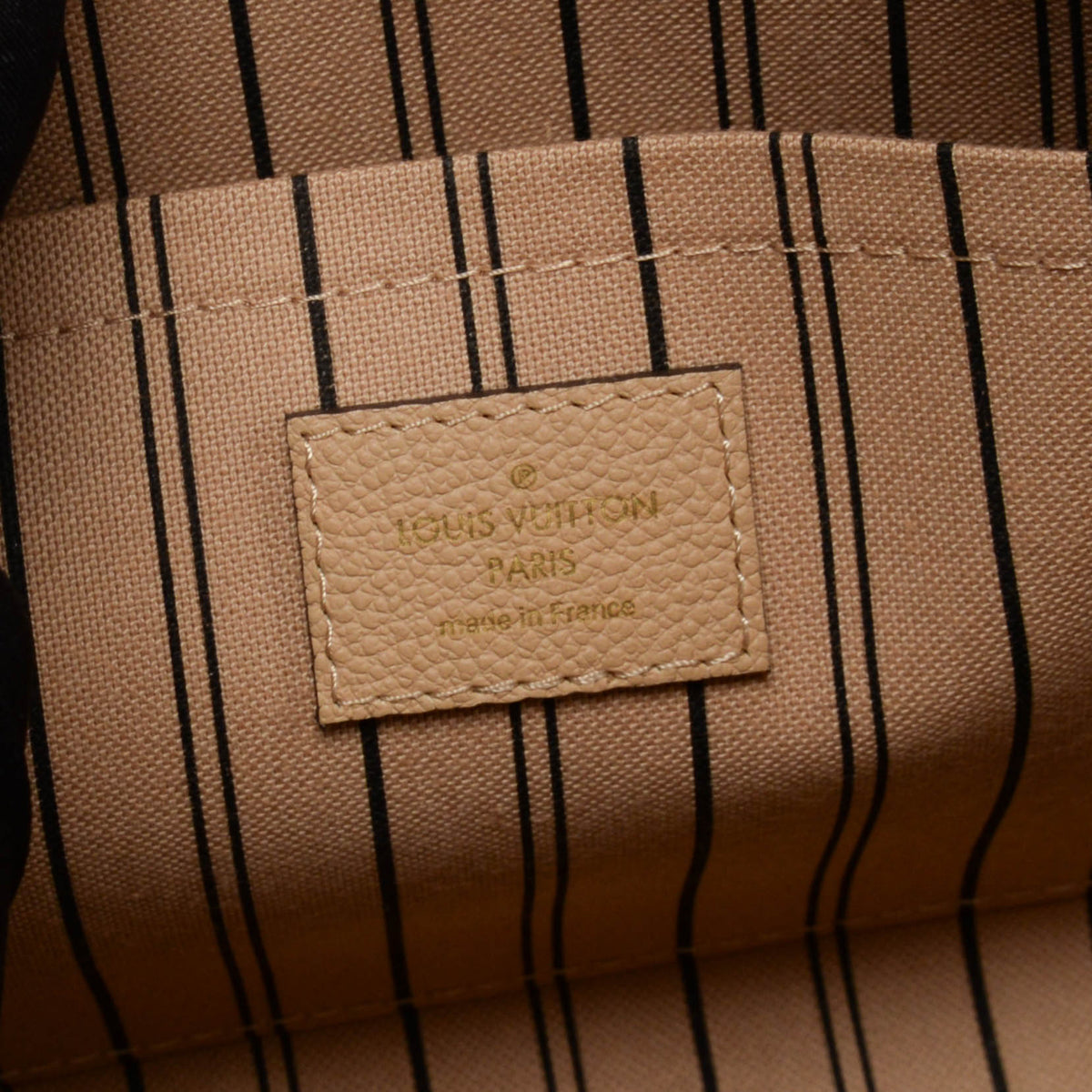 Louis Vuitton Beige Monogram Empreinte Montaigne MM Bag