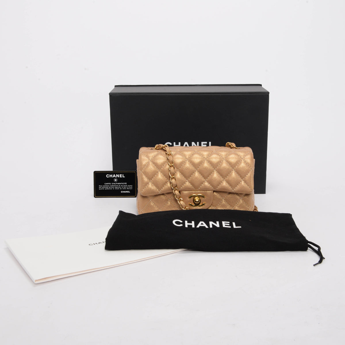 Chanel Pearly Gold Caviar Mini Rectangular Flap Bag