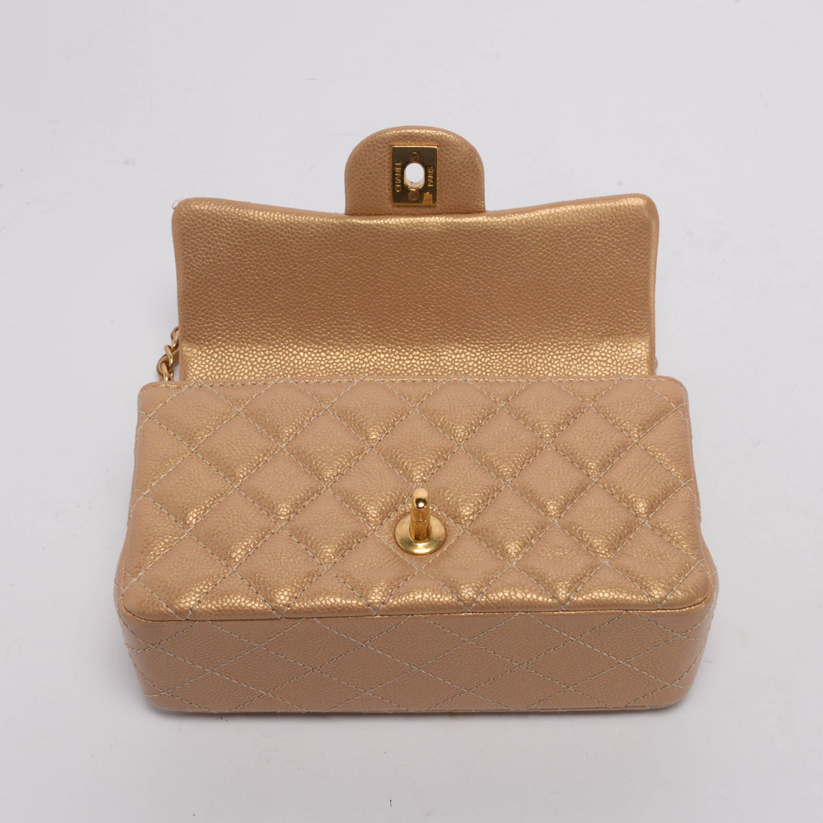 Chanel Pearly Gold Caviar Mini Rectangular Flap Bag