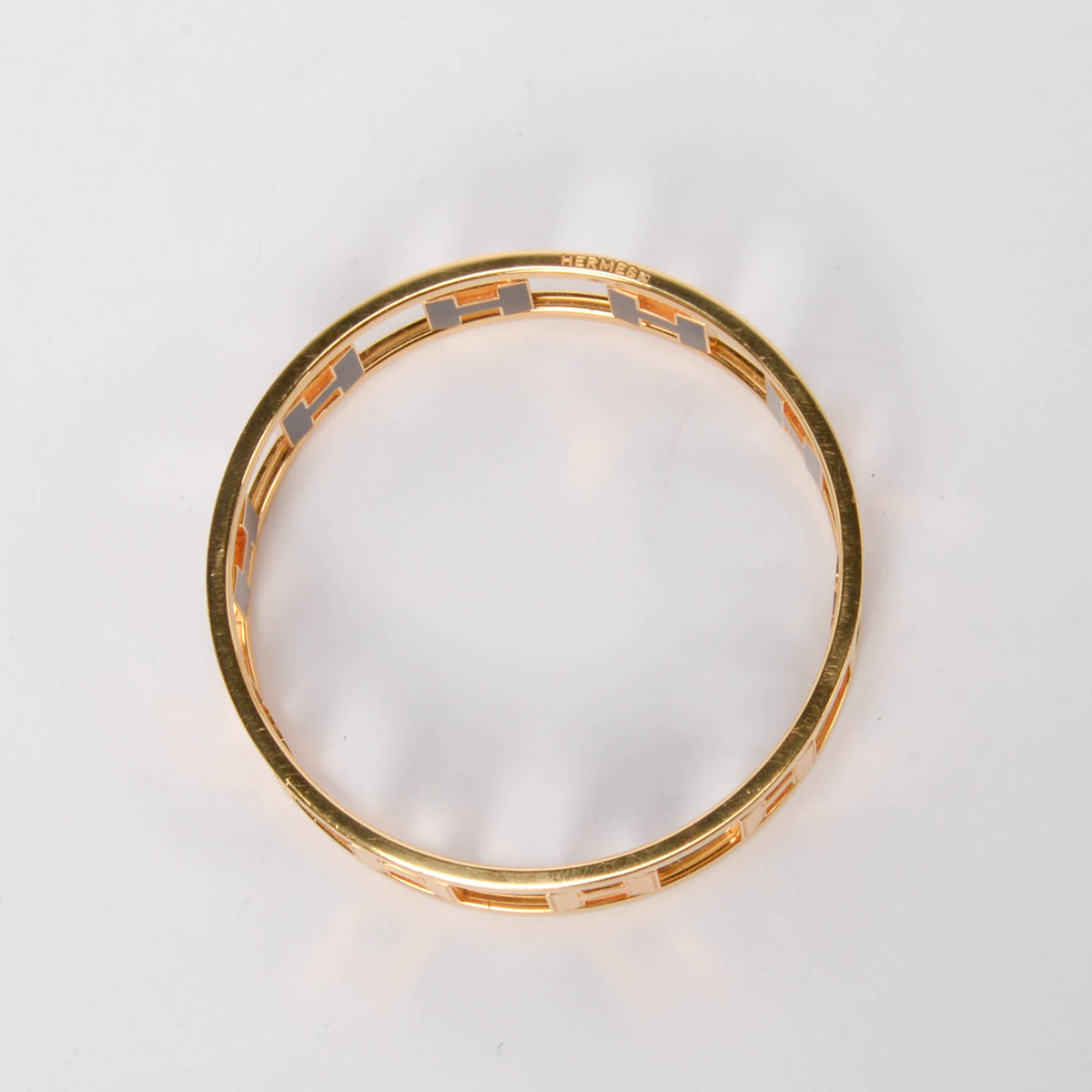 Hermes Black Enamel & Gold Plated Rondo Ash H Bangle