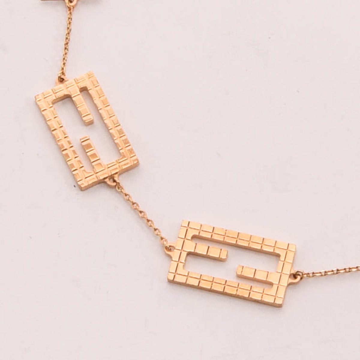 Fendi Gold Tone Metal Baguette Necklace
