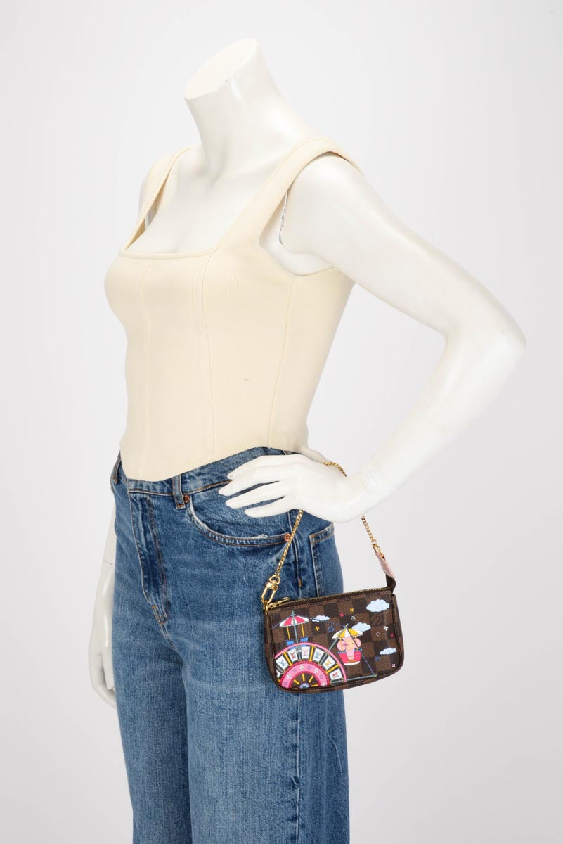 Louis Vuitton Damier Ebene Big Wheel Mini Pochette Accessoires