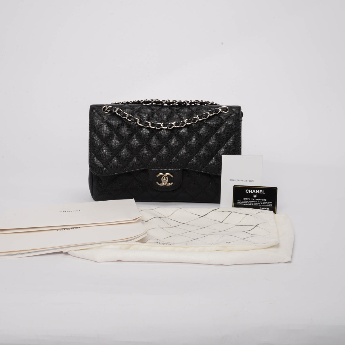 Chanel Black Quilted Caviar Large Classic Flap Bag