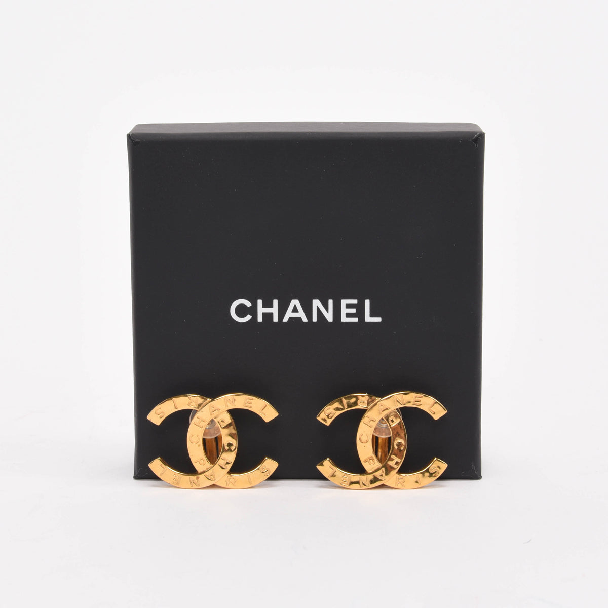 Chanel Gold Metal CC Paris Clip-On Earrings