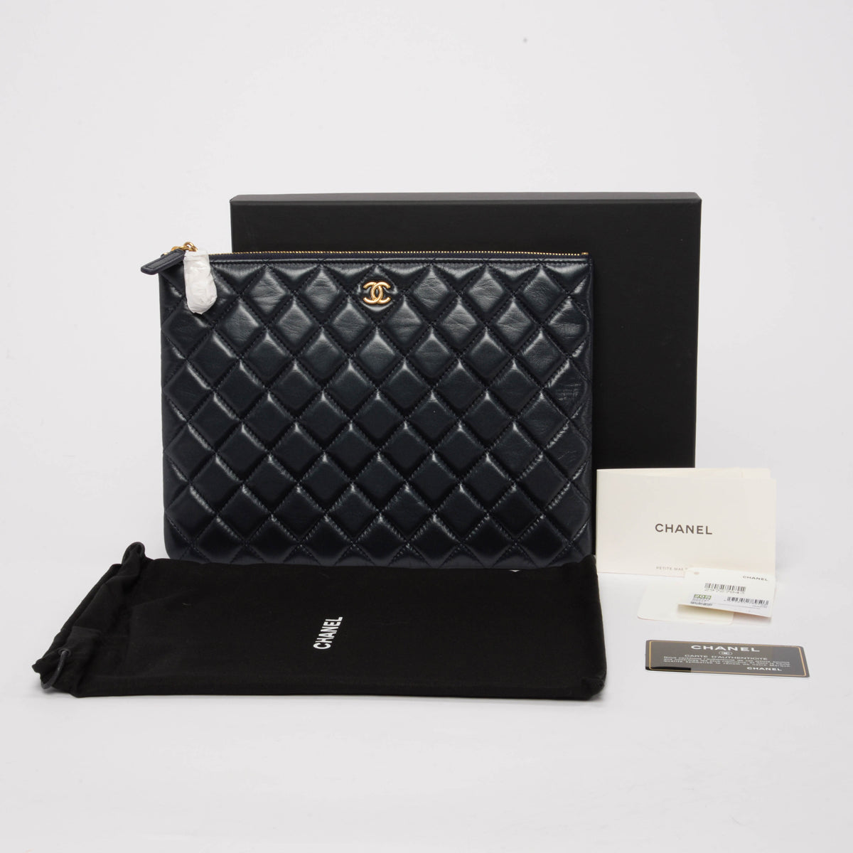 Chanel Navy Quilted Lambskin Small O-Case Pouch