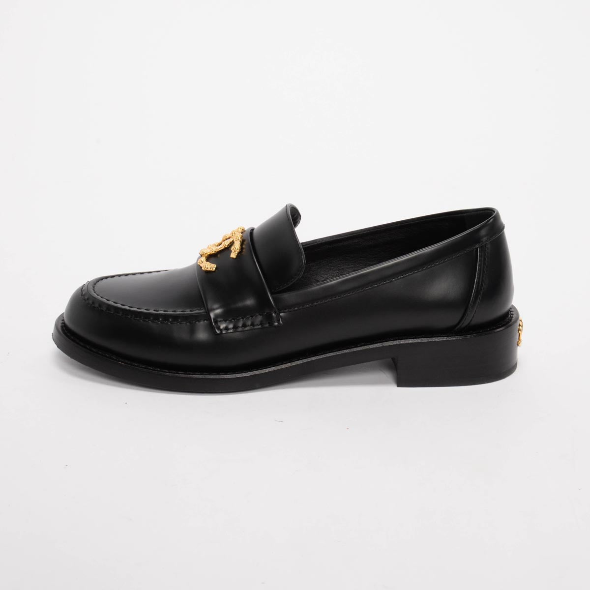 Chanel Black Smooth Calfskin CC Camellia Loafers 37