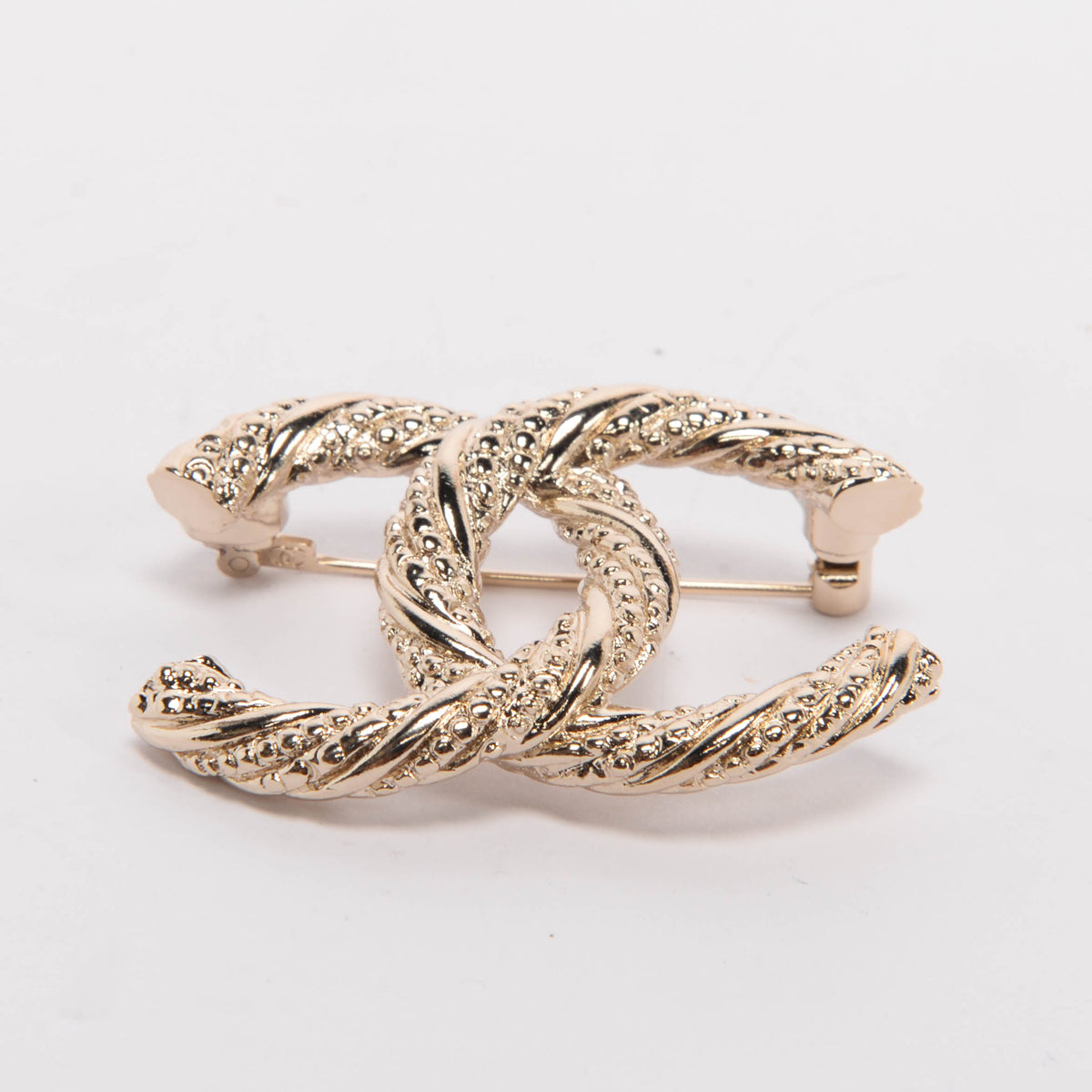 Chanel Light Gold Twisted CC Brooch