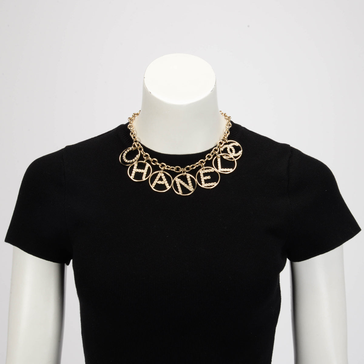 Chanel Light Gold Crystal Logo Spellout Necklace