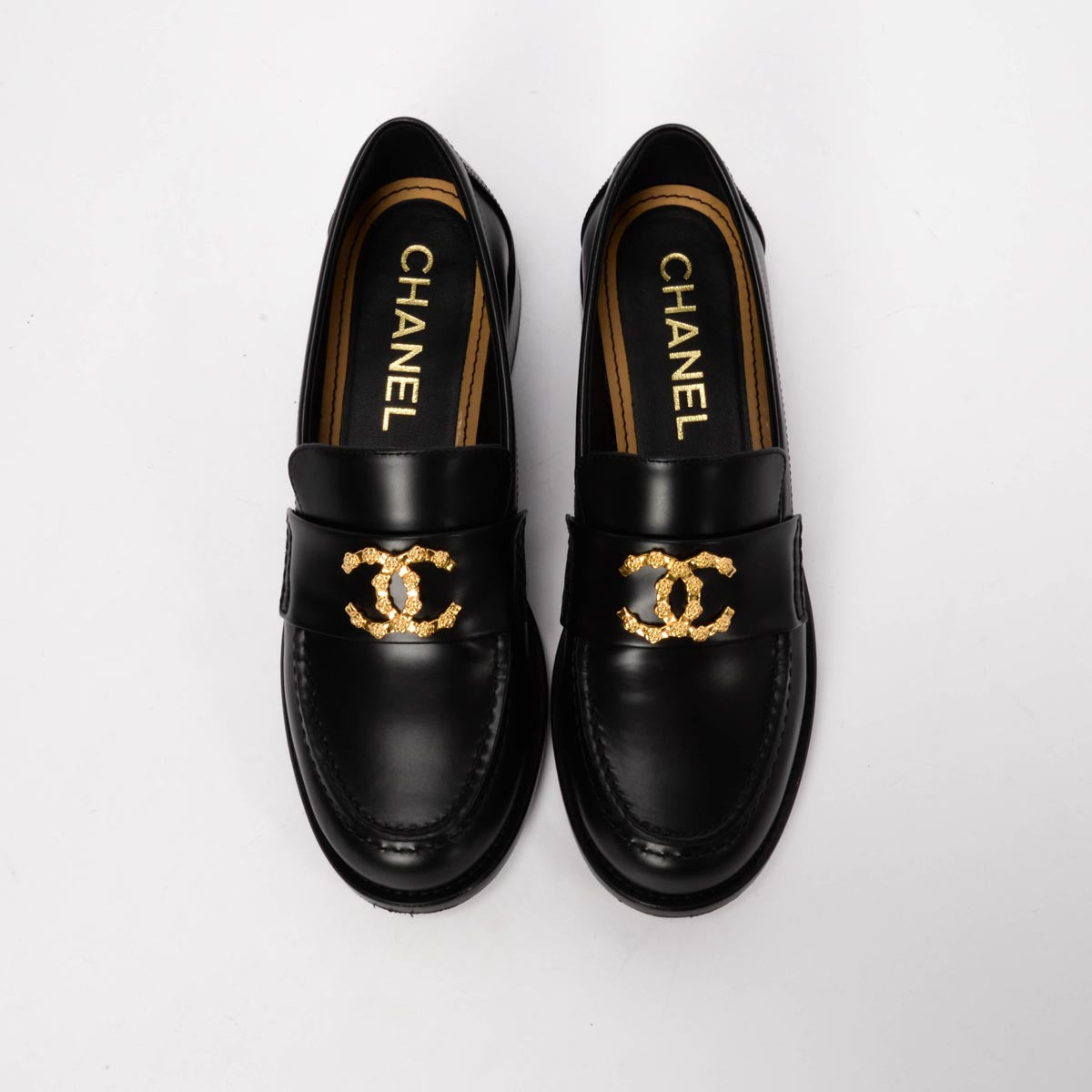 Chanel Black Smooth Calfskin CC Camellia Loafers 37