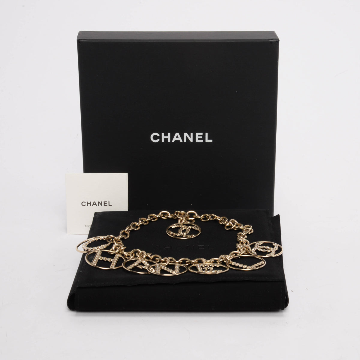 Chanel Light Gold Crystal Logo Spellout Necklace