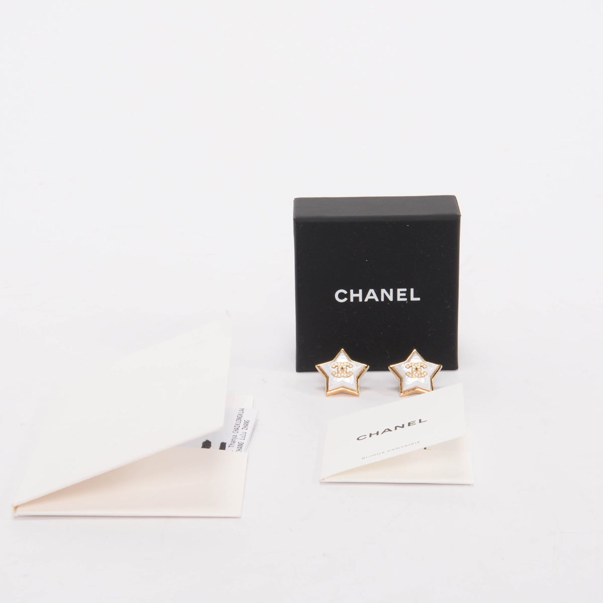 Chanel Gold Pearlescent CC Star Earrings